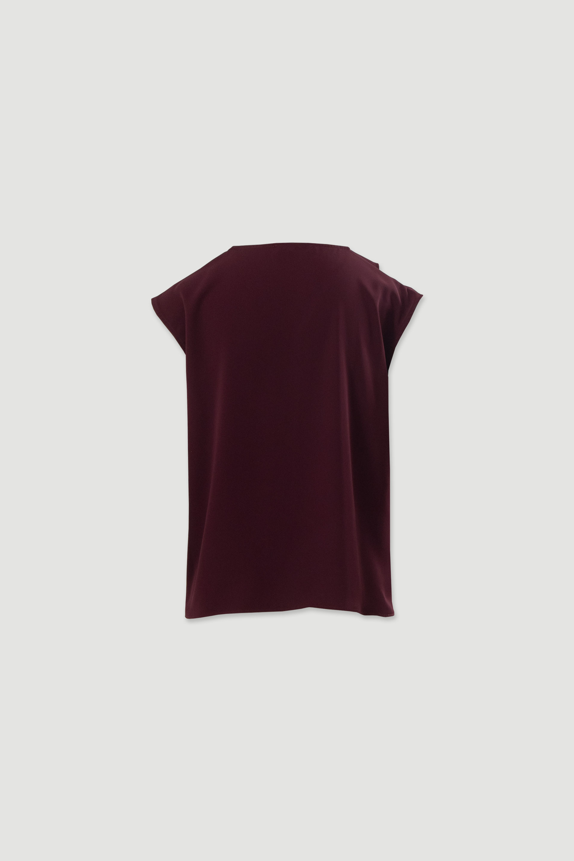 Blusa fluida con volante asimétrico