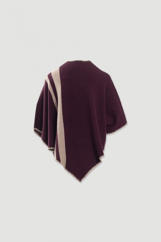 Knit cape with contrasting stripes Knit cape with contrasting stripes