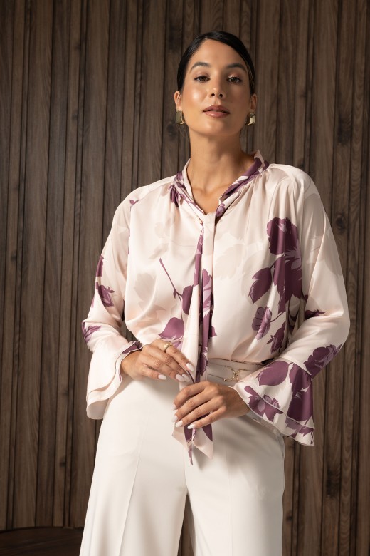 Fluid printed tunic with tie neckline Fluid printed tunic with tie neckline