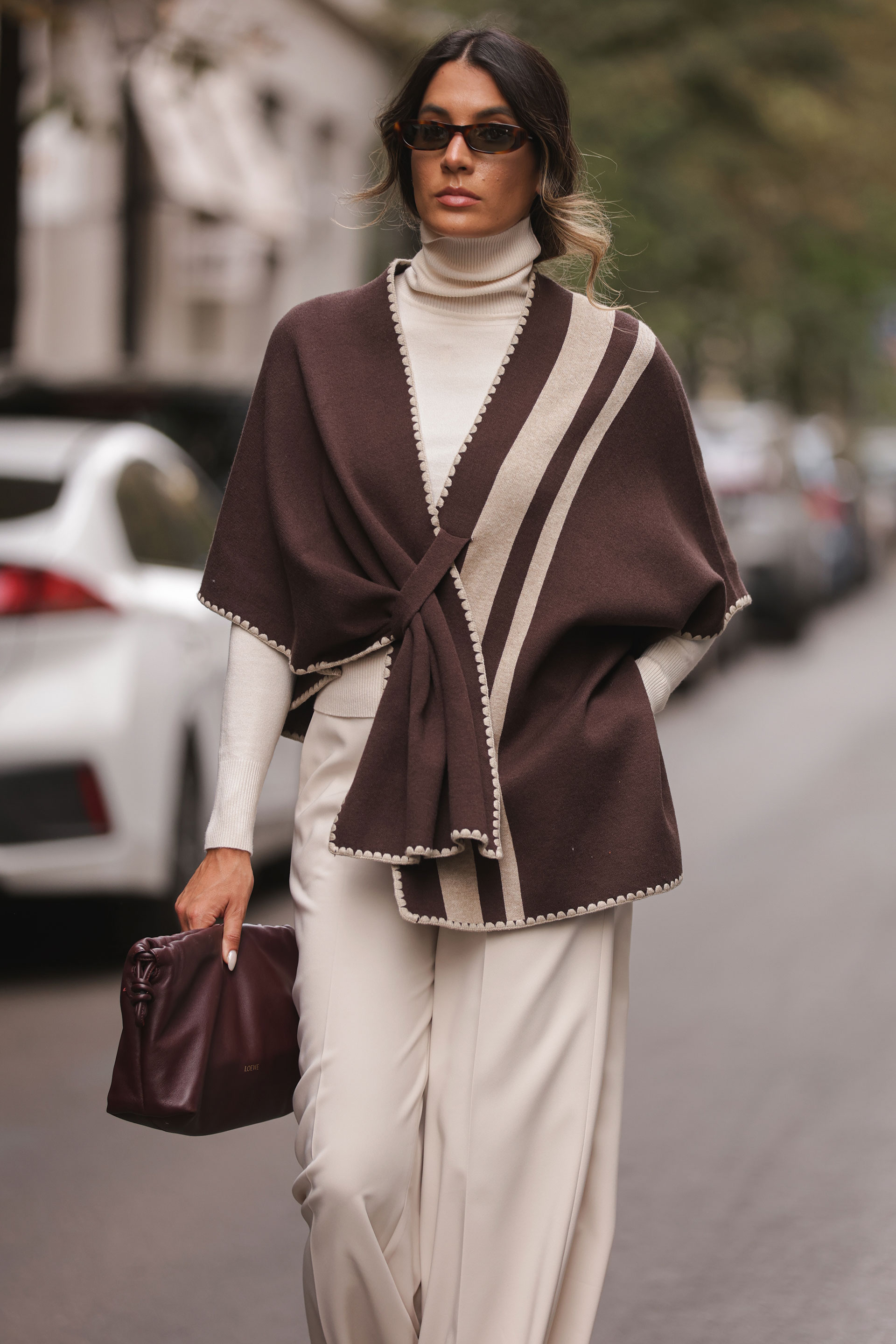 Knit cape with contrasting stripes