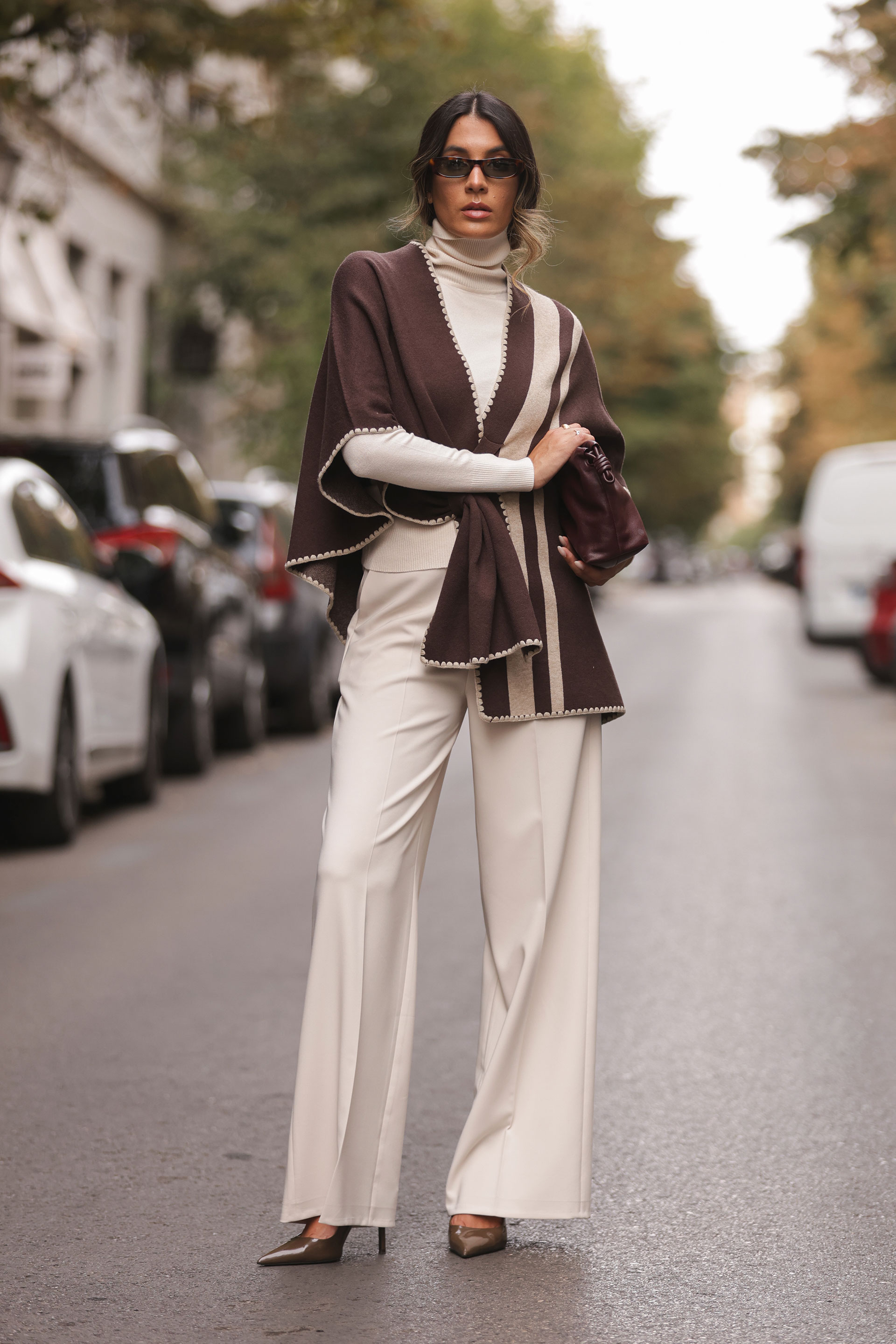 Knit cape with contrasting stripes