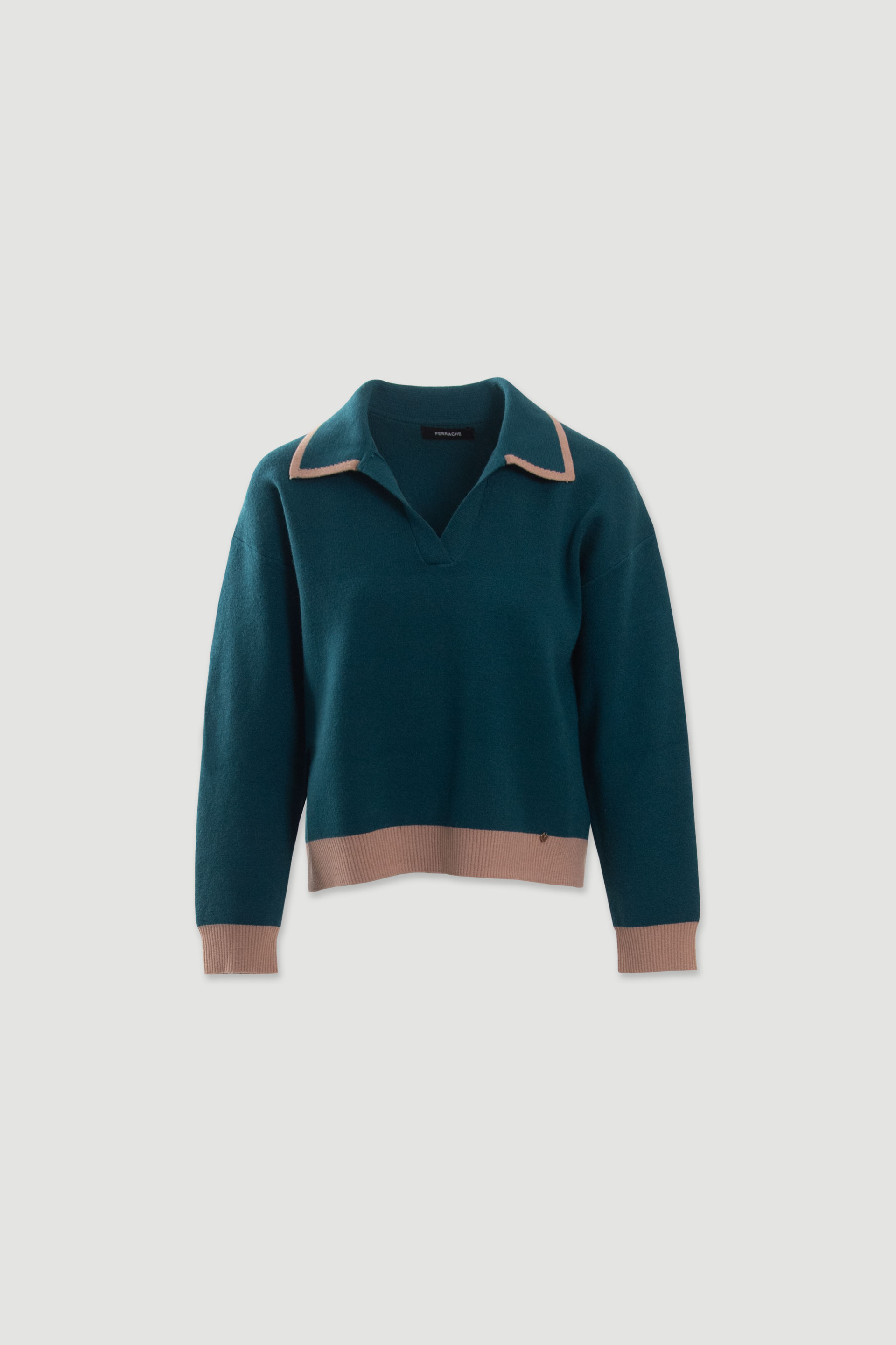 Polo de punto con detalles en contraste