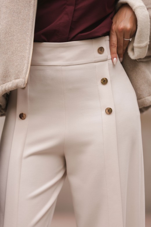 Wide leg trousers with decorative buttons Wide leg trousers with decorative buttons