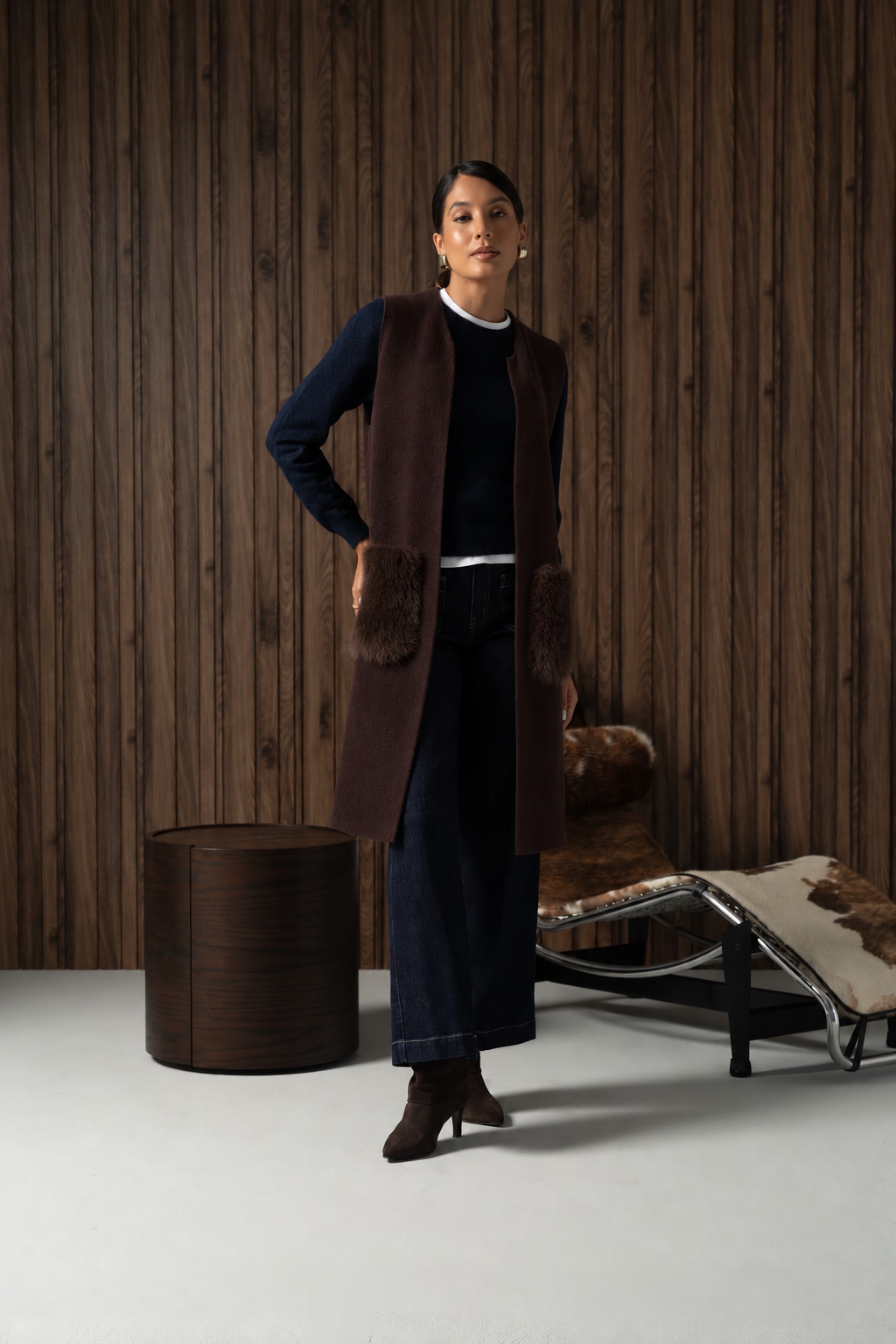 Long knit vest with faux fur pockets