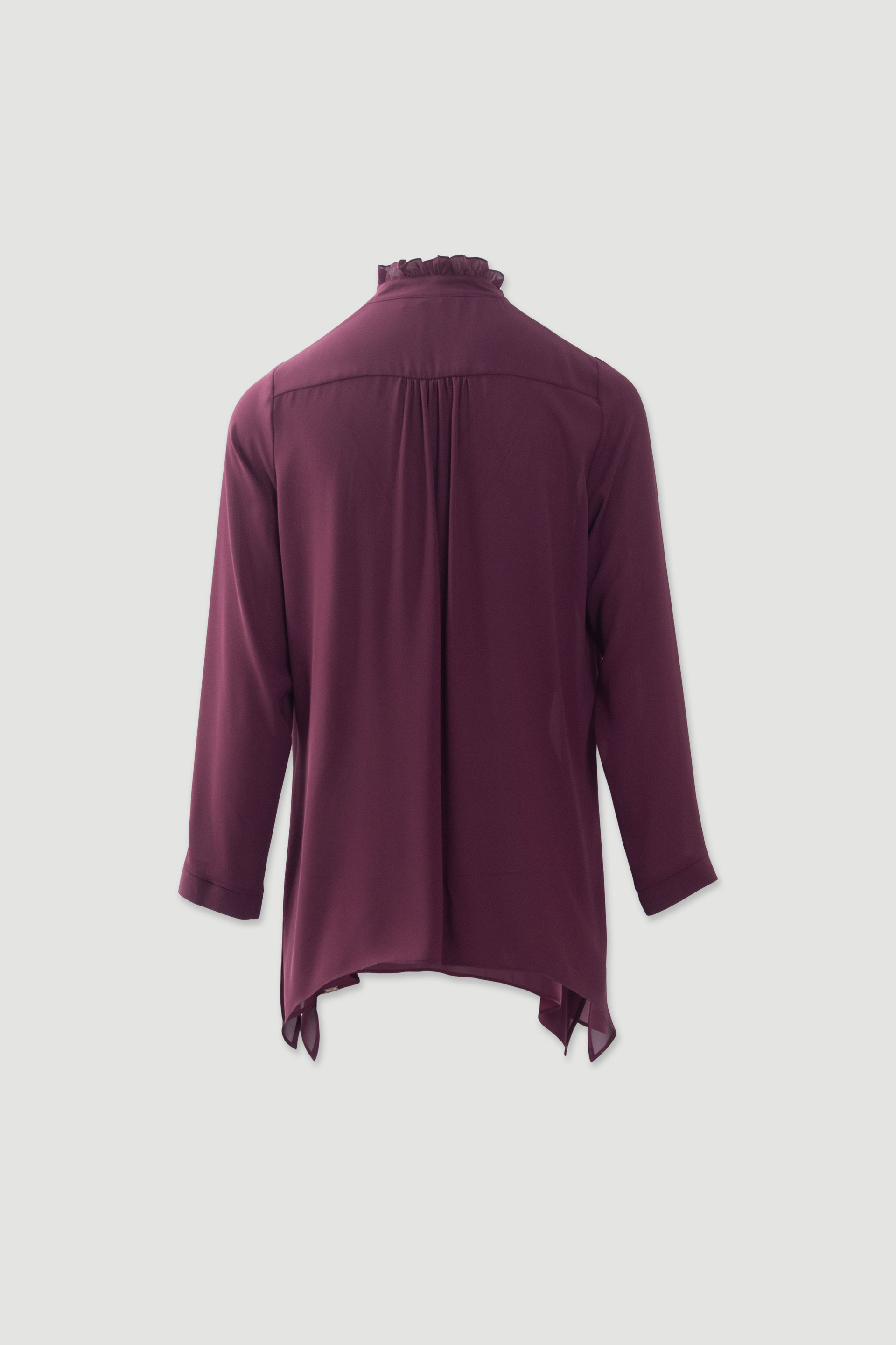 Fluid tunic with ruffled neckline