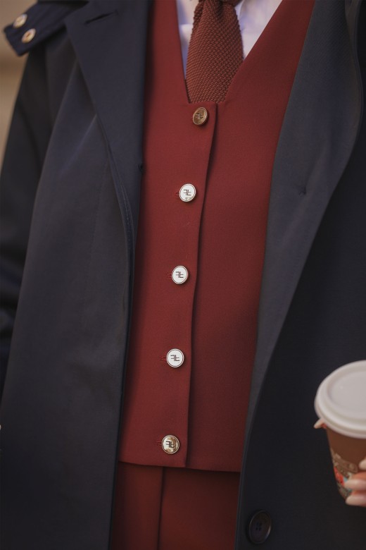 Fitted vest with V-neckline Fitted vest with V-neckline